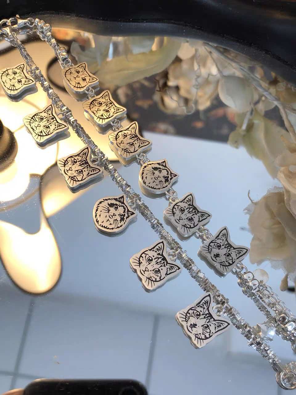 Custom pet memorial bracelet worn on wrist